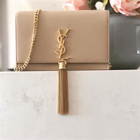 authentic ysl tassel clutch|ysl kate clutch sale.